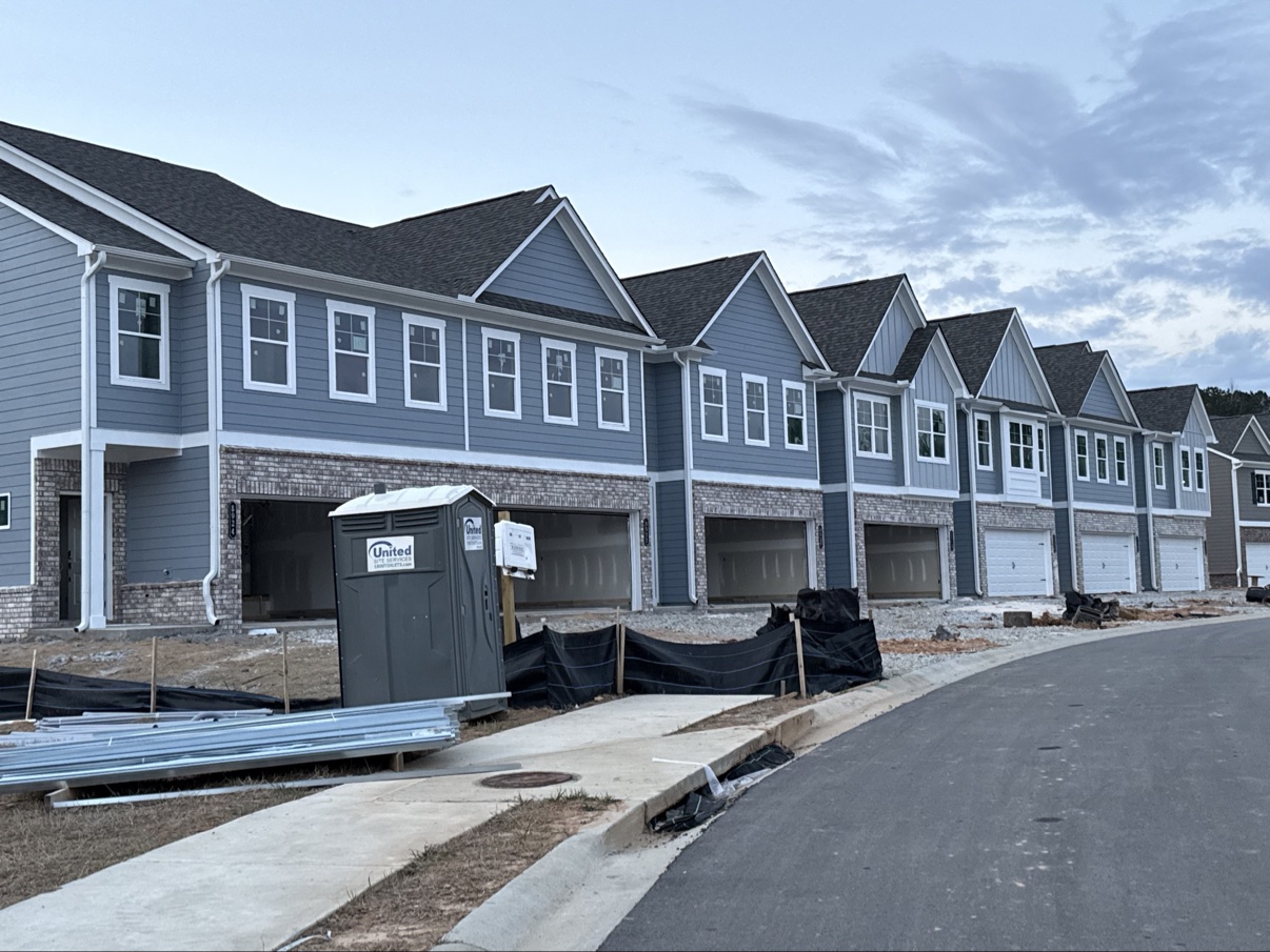 Finished townhomes with lap siding